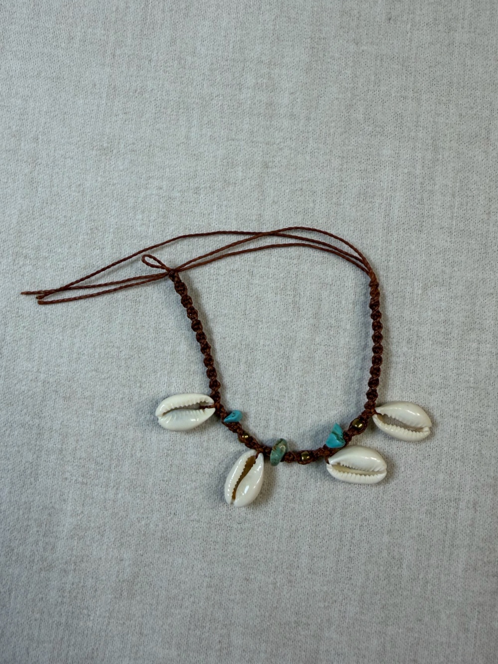 Handmade Brown Shell Beaded Necklace with Turquoise Accent